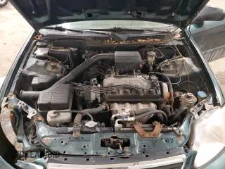 1999 Honda Civic VP z VIN 2HGEJ6611XH594868, wystawiony jako Copart lot #45193835 z przebiegiem 180 914 mil mil oraz Szkoda całkowita • Salvage title. Historia ofert i sprzedaży dostępna na DreamBid. Obrazek 11.