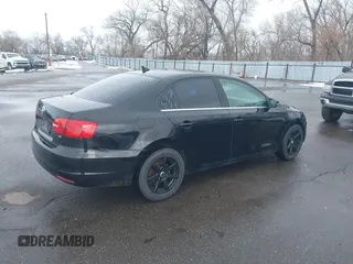 2014 Volkswagen Jetta SE with VIN 3VWD17AJXEM370663, listed as a IAAI auction lot 41612207 with 135,215 mi miles and . Bid and sale history available at DreamBid. Image 4.