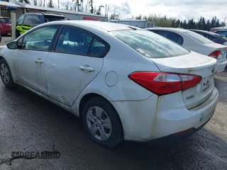 2015 Kia Forte LX with VIN KNAFX4A63F5258103, listed as a IAAI auction lot 41980166 with 144,350 mi miles. Bid and sale history available at carsss.com. Image 3.