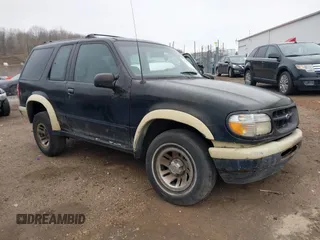 1998 Ford Explorer Sport with VIN 1FMYU22X2WUC96360, listed as a IAAI auction lot 41996511 with 295,891 mi miles and . Bid and sale history available at DreamBid. Image 1.