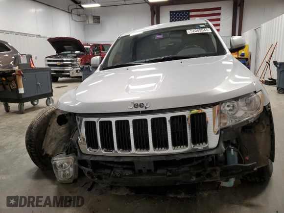 2011 Jeep Grand Cherokee Laredo z VIN 1J4RR4GGXBC609891, wystawiony jako Copart lot #52089645 z przebiegiem 180 895 mil mil oraz Szkoda całkowita • Salvage title. Historia ofert i sprzedaży dostępna na DreamBid. Obrazek 5.