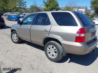 2003 Acura MDX Touring Pkg with VIN 2HNYD18623H549599, listed as a IAAI auction lot 41879934 with 242,896 mi miles. Bid and sale history available at carsss.com. Image 3.