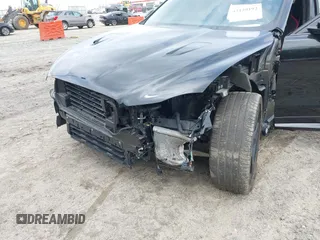 2022 Jaguar F-Pace SVR z VIN SADCZ2EE0NA702862, wystawiony jako IAAI lot #42129192 z przebiegiem 20 580 mil mil oraz . Historia ofert i sprzedaży dostępna na DreamBid. Obrazek 6.