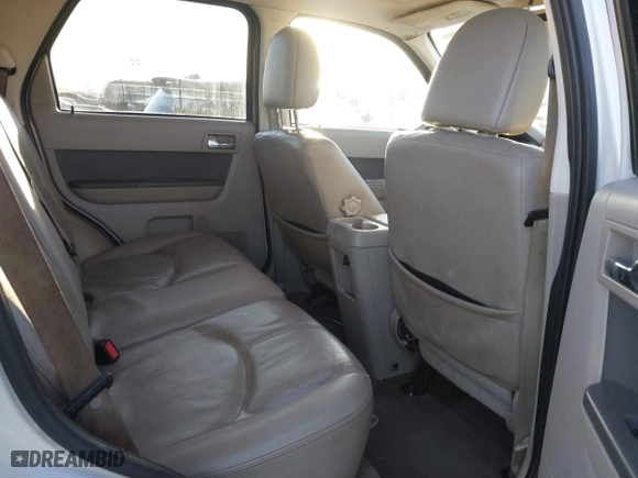 2009 Mercury Mariner Hybrid with VIN 4M2CU29399KJ05674, listed as a IAAI auction lot 40843807 with 194,987 mi miles. Bid and sale history available at carsss.com. Image 8.