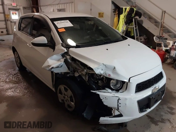 2016 Chevrolet Sonic LS with VIN 1G1JA6SH1G4174680, listed as a IAAI auction lot 41299210 with 90,210 mi miles and . Bid and sale history available at DreamBid. Image 1.
