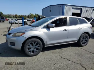 2009 Mazda CX-7 Grand Touring z VIN JM3ER29L390227112, wystawiony jako Copart lot #59523665 z przebiegiem 183 053 mil mil oraz Szkoda całkowita • Salvage title. Historia ofert i sprzedaży dostępna na DreamBid. Obrazek 1.