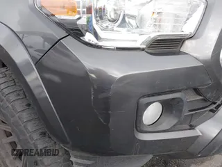 2022 Toyota Tacoma SR5 with VIN 3TMBZ5DN2NM034561, listed as a IAAI auction lot 40867443 with 51,728 mi miles and . Bid and sale history available at DreamBid. Image 6.