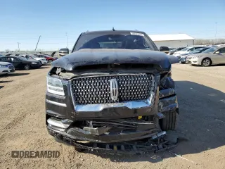 2020 Lincoln Navigator Reserve z VIN 5LMJJ2LT2LEL09441, wystawiony jako Copart lot #50593575 z przebiegiem 59 347 mil mil oraz Szkoda całkowita • Salvage title. Historia ofert i sprzedaży dostępna na DreamBid. Obrazek 5.