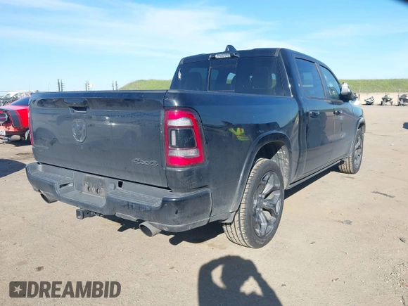 2023 Ram 1500 Limited with VIN 1C6SRFHT5PN542859, listed as a IAAI auction lot 41669646 with 80,045 mi miles and . Bid and sale history available at DreamBid. Image 4.