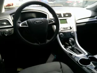 2015 Ford Fusion S with VIN 1FA6P0G71F5127771, listed as a IAAI auction lot 42197577 with 179,301 mi miles and . Bid and sale history available at carsss.com. Image 1.