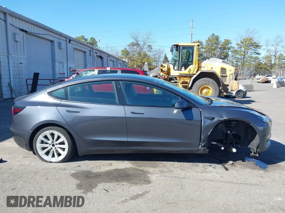 2022 Tesla Model 3 Long Range with VIN 5YJ3E1EB3NF290550, listed as a IAAI auction lot 41826287 with 67,648 mi miles and . Bid and sale history available at DreamBid. Image 14.