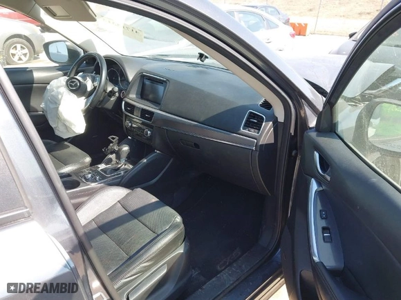 2016 Mazda CX-5 Grand Touring with VIN JM3KE4DY5G0837958, listed as a IAAI auction lot 41713313 with NaN miles. Bid and sale history available at carsss.com. Image 5.