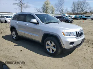 2012 Jeep Grand Cherokee Laredo with VIN 1C4RJFAG4CC123354, listed as a Copart auction lot 52711295 with 151,004 mi miles and Salvage Title. Bid and sale history available at carsss.com. Image 4.