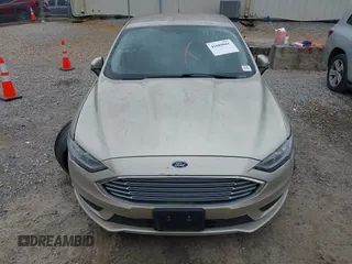 2018 Ford Fusion S z VIN 3FA6P0UU0JR157005, wystawiony jako IAAI lot #41689881 z przebiegiem Nie podano mil oraz . Historia ofert i sprzedaży dostępna na DreamBid. Obrazek 11.