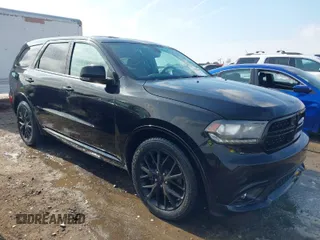 2015 Dodge Durango R/T with VIN 1C4SDHCT2FC760097, listed as a IAAI auction lot 41398292 with 177,356 mi miles and . Bid and sale history available at carsss.com. Image 1.