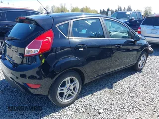 2019 Ford Fiesta SE with VIN 3FADP4EJ1KM155491, listed as a IAAI auction lot 42041050 with 72,381 mi miles. Bid and sale history available at carsss.com. Image 4.