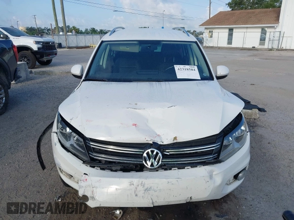 2013 Volkswagen Tiguan SE with VIN WVGAV7AX5DW545202, listed as a IAAI auction lot 42318584 with 91,556 mi miles and . Bid and sale history available at DreamBid. Image 12.