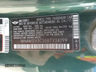 2011 MINI Hardtop S with VIN WMWSV3C55BTY24299, listed as a Copart auction lot 54725755 with 82,489 mi miles and Salvage Title. Bid and sale history available at DreamBid. Image 12.