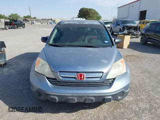 2009 Honda CR-V EX with VIN JHLRE38599C004833, listed as a IAAI auction lot 41982725 with 212,280 mi miles and . Bid and sale history available at carsss.com. Image 12.