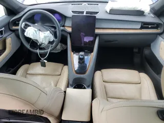 2022 Polestar 2 z VIN LPSED3KA3NL080345, wystawiony jako Copart lot #48225545 z przebiegiem Nie podano mil oraz Szkody całkowita. Historia ofert i sprzedaży dostępna na DreamBid. Obrazek 8.