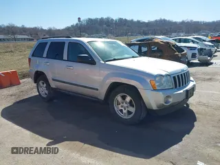 2007 Jeep Grand Cherokee Laredo z VIN 1J8GR48K67C543257, wystawiony jako IAAI lot #41733644 z przebiegiem 201 936 mil mil oraz . Historia ofert i sprzedaży dostępna na DreamBid. Obrazek 13.