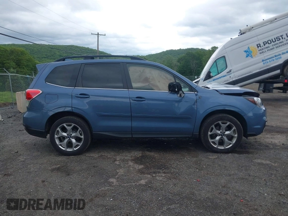 2018 Subaru Forester Touring with VIN JF2SJAWC5JH528330, listed as a IAAI auction lot 42344618 with 62,446 mi miles and . Bid and sale history available at DreamBid. Image 13.