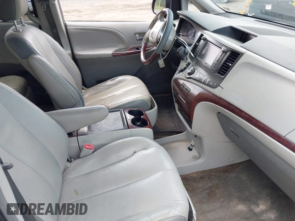 2014 Toyota Sienna Limited z VIN 5TDDK3DC6ES073282, wystawiony jako IAAI lot #42468546 z przebiegiem 278 905 mil mil oraz . Historia ofert i sprzedaży dostępna na DreamBid. Obrazek 5.
