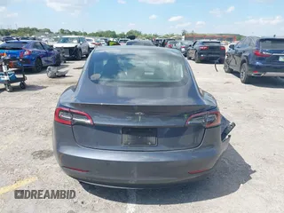2023 Tesla Model 3 with VIN 5YJ3E1EA3PF623114, listed as a IAAI auction lot 41710385 with 31,663 mi miles and . Bid and sale history available at carsss.com. Image 16.