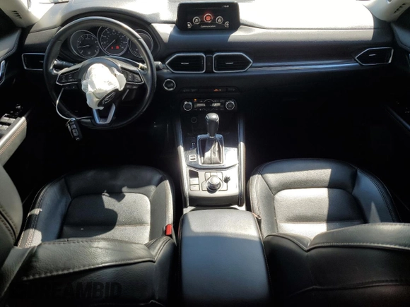 2018 Mazda CX-5 Grand Touring with VIN JM3KFBDM0J0419989, listed as a Copart auction lot 62868005 with 120,217 mi miles and Salvage title. Bid and sale history available at DreamBid. Image 8.