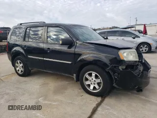 2010 Honda Pilot Touring with VIN 5FNYF3H83AB019030, listed as a Copart auction lot 82398644 with 180,912 mi miles and Salvage Title. Bid and sale history available at DreamBid. Image 4.