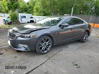 2017 Mazda 6 Grand Touring с VIN JM1GL1W55H1140064, выставлен на аукционе Copart как лот 57503425 с пробегом 74 304 миль миль и Списание • Salvage title. История ставок и продаж доступна на DreamBid. Изображение 1.