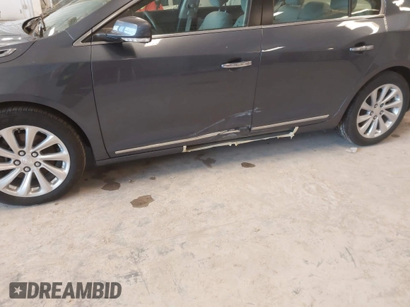 2014 Buick LaCrosse Leather with VIN 1G4GB5G39EF132695, listed as a IAAI auction lot 41728596 with 124,639 mi miles and . Bid and sale history available at DreamBid. Image 6.