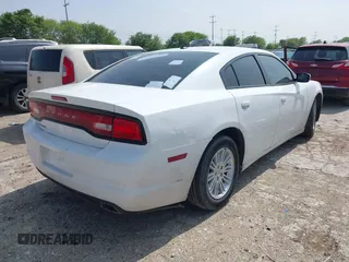 2013 Dodge Charger SXT with VIN 2C3CDXHG0DH664865, listed as a IAAI auction lot 41914053 with 195,211 mi miles. Bid and sale history available at carsss.com. Image 4.