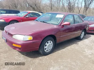 1996 Toyota Camry DX with VIN 4T1BG12K1TU785209, listed as a IAAI auction lot 41802026 with 223,452 mi miles. Bid and sale history available at carsss.com. Image 2.