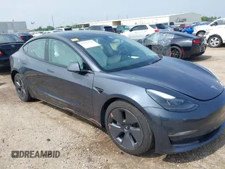 2023 Tesla Model 3 z VIN 5YJ3E1EAXPF414646, wystawiony jako IAAI lot #39514743 z przebiegiem 10 529 mil mil oraz . Historia ofert i sprzedaży dostępna na DreamBid. Obrazek 6.
