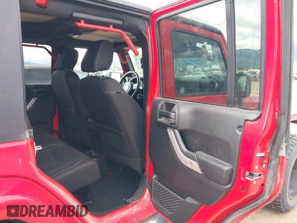 2018 Jeep Wrangler JK Unlimited Sahara with VIN 1C4HJWEG3JL893970, listed as a IAAI auction lot 39530074 with 72,079 mi miles. Bid and sale history available at carsss.com. Image 8.