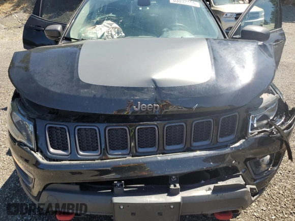 2017 Jeep Compass Trailhawk with VIN 3C4NJDDBXHT668053, listed as a Copart auction lot 63032155 with 94,090 mi miles and Salvage title. Bid and sale history available at DreamBid. Image 12.