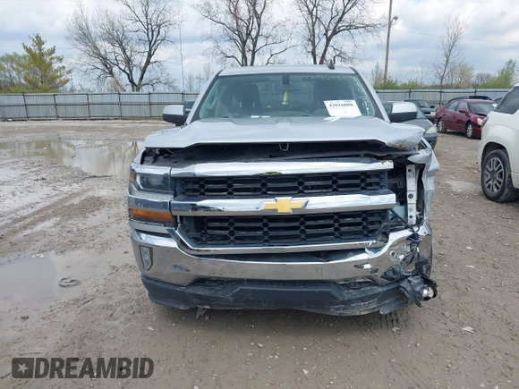 2018 Chevrolet Silverado 1500 LT with VIN 1GCVKREH9JZ119861, listed as a IAAI auction lot 42016088 with 91,176 mi miles and . Bid and sale history available at DreamBid. Image 12.