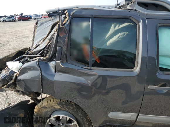 2015 Nissan Xterra Pro-4X z VIN 5N1AN0NWXFN664591, wystawiony jako Copart lot #60423525 z przebiegiem 246 477 mil mil oraz Szkoda całkowita • Salvage title. Historia ofert i sprzedaży dostępna na DreamBid. Obrazek 10.