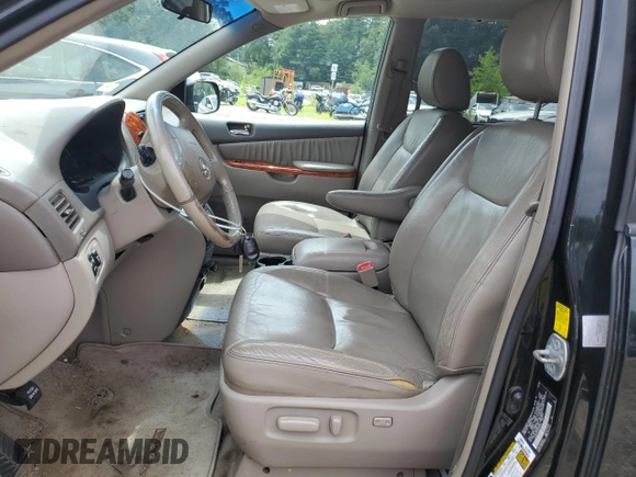 2010 Toyota Sienna XLE with VIN 5TDYK4CC2AS307940, listed as a Copart auction lot 64662065 with 275,846 mi miles and Clean title. Bid and sale history available at DreamBid. Image 7.