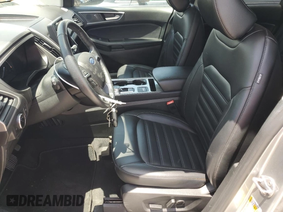 2023 Ford Edge SEL z VIN 2FMPK4J90PBA38667, wystawiony jako Copart lot #54534815 z przebiegiem Nie podano mil oraz Szkoda całkowita • Salvage title. Historia ofert i sprzedaży dostępna na DreamBid. Obrazek 7.