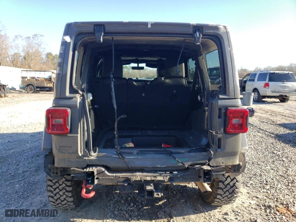 2020 Jeep Wrangler Unlimited Rubicon with VIN 1C4HJXFG7LW187302, listed as a Copart auction lot 87731575 with 80,564 mi miles and Salvage Title. Bid and sale history available at carsss.com. Image 6.