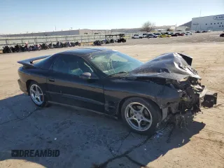2001 Pontiac Firebird Formula with VIN 2G2FV22GX12107045, listed as a Copart auction lot 88646235 with 165,488 mi miles and Salvage Title. Bid and sale history available at carsss.com. Image 4.