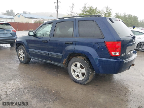 2006 Jeep Grand Cherokee Laredo with VIN 1J4GR48KX6C135070, listed as a IAAI auction lot 41966282 with 142,833 mi miles. Bid and sale history available at carsss.com. Image 3.