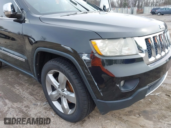 2013 Jeep Grand Cherokee Overland with VIN 1C4RJECG5DC621149, listed as a IAAI auction lot 41255140 with 157,355 mi miles. Bid and sale history available at carsss.com. Image 6.