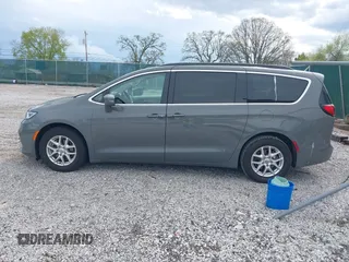 2022 Chrysler Pacifica Touring L z VIN 2C4RC1BG1NR133085, wystawiony jako IAAI lot #41981302 z przebiegiem 75 281 mil mil oraz . Historia ofert i sprzedaży dostępna na DreamBid. Obrazek 14.