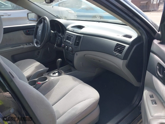 2010 Kia Optima LX with VIN KNAGG4A88A5436716, listed as a IAAI auction lot 41890607 with 264,913 mi miles. Bid and sale history available at carsss.com. Image 5.