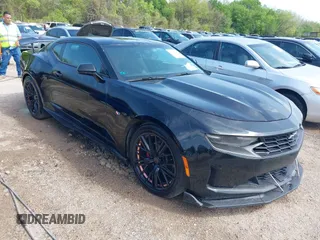 2019 Chevrolet Camaro 1LT with VIN 1G1FB1RX5K0133813, listed as a IAAI auction lot 41927669 with 89,557 mi miles. Bid and sale history available at carsss.com. Image 1.