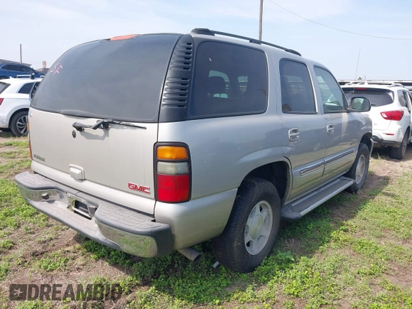 2004 GMC Yukon SLE z VIN 1GKEC13V94R293218, wystawiony jako IAAI lot #41939912 z przebiegiem 336 393 mil mil oraz . Historia ofert i sprzedaży dostępna na DreamBid. Obrazek 4.
