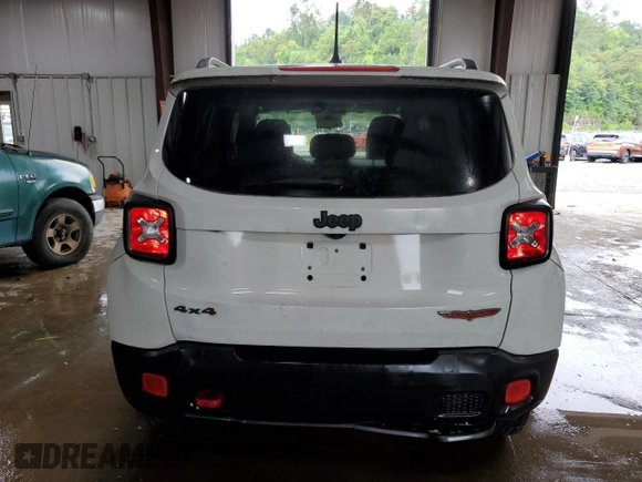 2015 Jeep Renegade Trailhawk with VIN ZACCJBCT8FPB78351, listed as a Copart auction lot 64036095 with 127,784 mi miles and Salvage title. Bid and sale history available at DreamBid. Image 6.